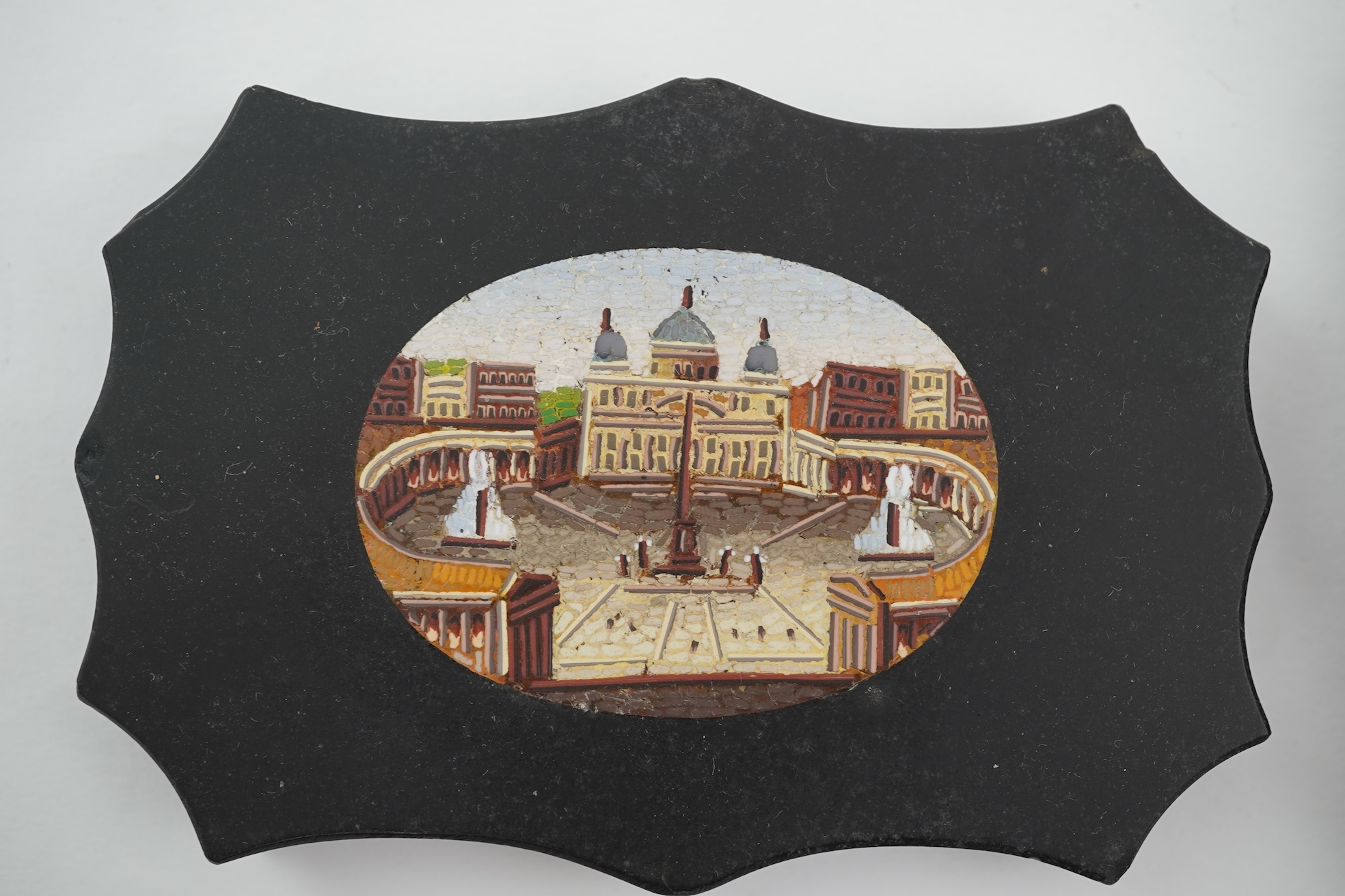 Two Italian micro-mosaic inlaid black slate paperweights, 19th century